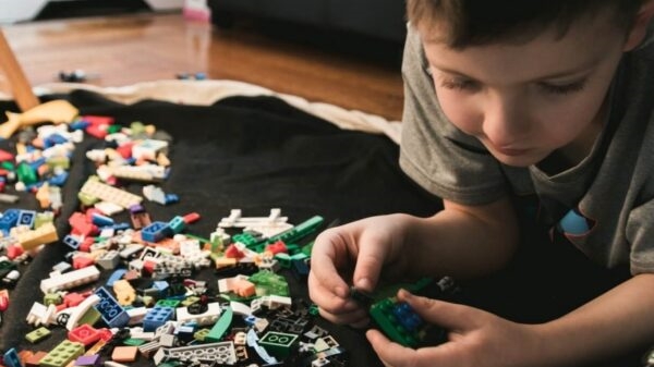 a boy is playing puzzles